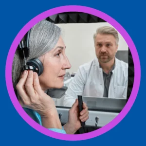 A woman takes a hearing test. 