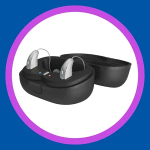 Starkey Edge AI hearing aids sit in their black charging case. 