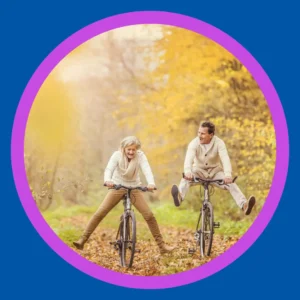 A couple bikes together in a forest. 