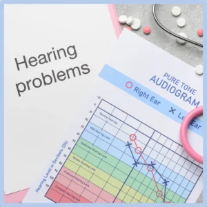 An audiogram sits next to a page saying, "Hearing problems."
