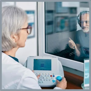 A man gets a hearing test at a hearing center. 