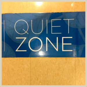 A sign says, “Quiet Zone,” in large letters. 