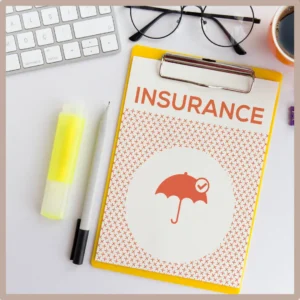 A clipboard says “Insurance” and shows an umbrella with a check mark. 