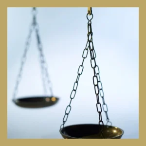 An empty balance scale stands against a blue background.