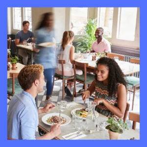 A couple enjoys dinner in a restaurant.
