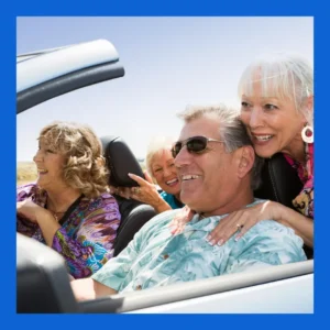 Two older couples drive around in a convertible. 