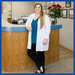 Dr. Jade Husby stands in the Sioux Falls hearing center.