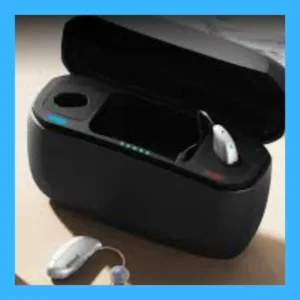 ReSound Nexia hearing aids sit in their charging case.