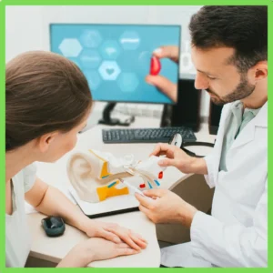 An audiologist talks to a patient. 