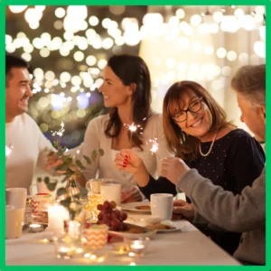 Friends smile at a holiday dinner. 