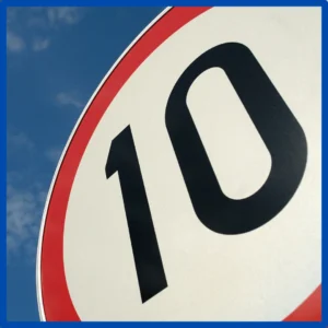 A road sign has the number "10" on it.