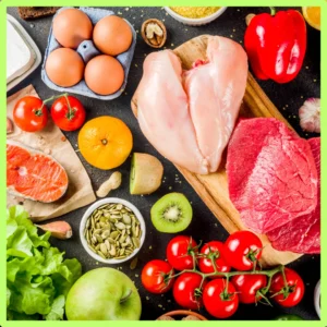 An array of fruits, vegetables and proteins sit on a table.