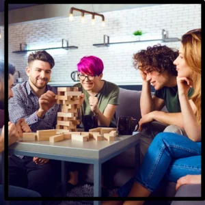 Friends play Jenga together. 