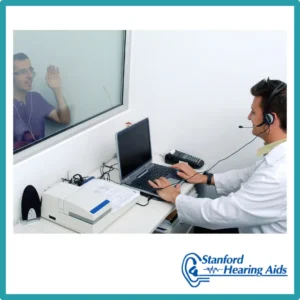 A man takes a hearing test. 
