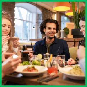 Friends enjoy dinner together.