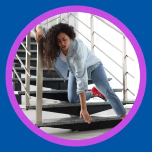 A woman falls down the stairs.
