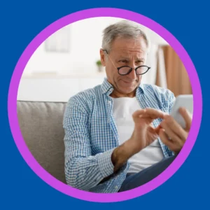 A man looks at his phone in a confused way. 