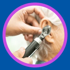 An audiologist uses an otoscope. 