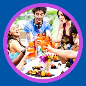 People enjoy an outdoor cocktail party. 