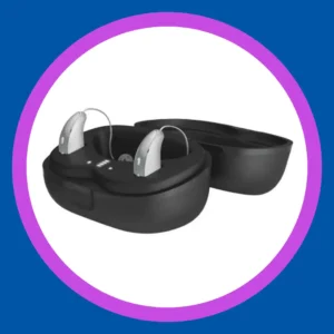 Hearing aids sit in their charging case. 