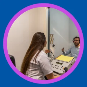 A man takes a hearing test. 