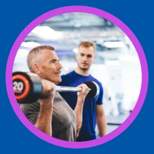 An older man lifts weights at the gym. 