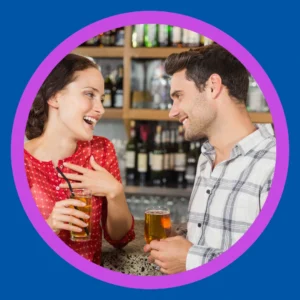 Two people talk during Happy Hour. 