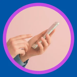 Hands use a cell phone. 