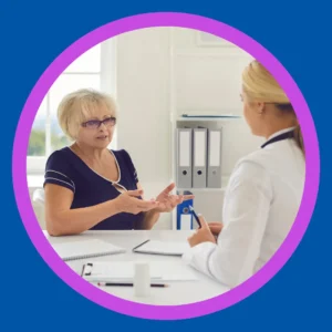 A woman consults with her audiologist.