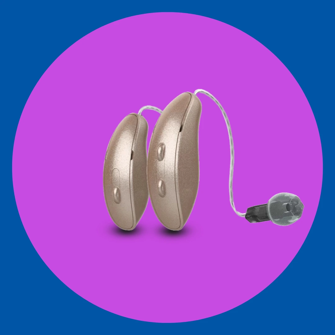 Starkey Edge AI hearing aids rest on a purple background.