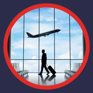 A man walks through an airport. 