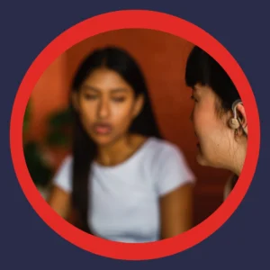 Two people talk quietly.