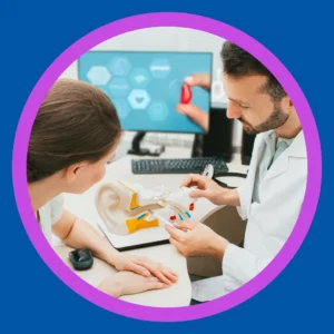An audiologist consults with a patient. 