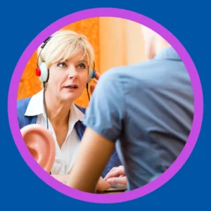 A woman takes a hearing test. 