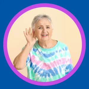 A woman cups her hair by her ear. 