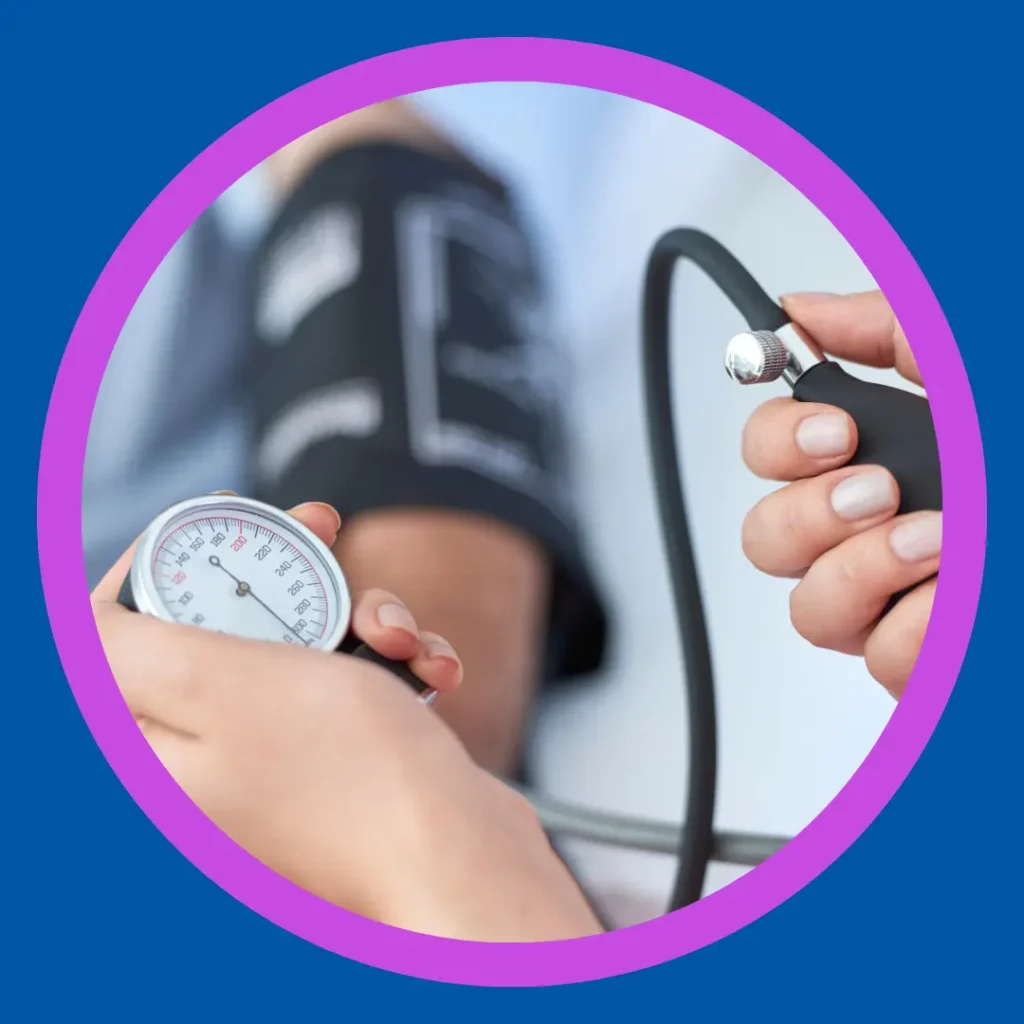 A person has their blood pressure taken.