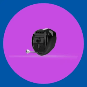 A black in the canal hearing aid sits on a purple background. 