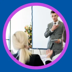 A man presents at work. 