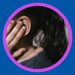 Fingers touch an ear.