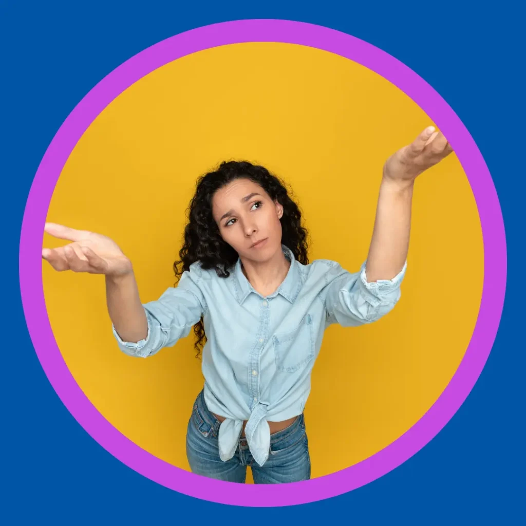 A woman holds up her arms in confusion.